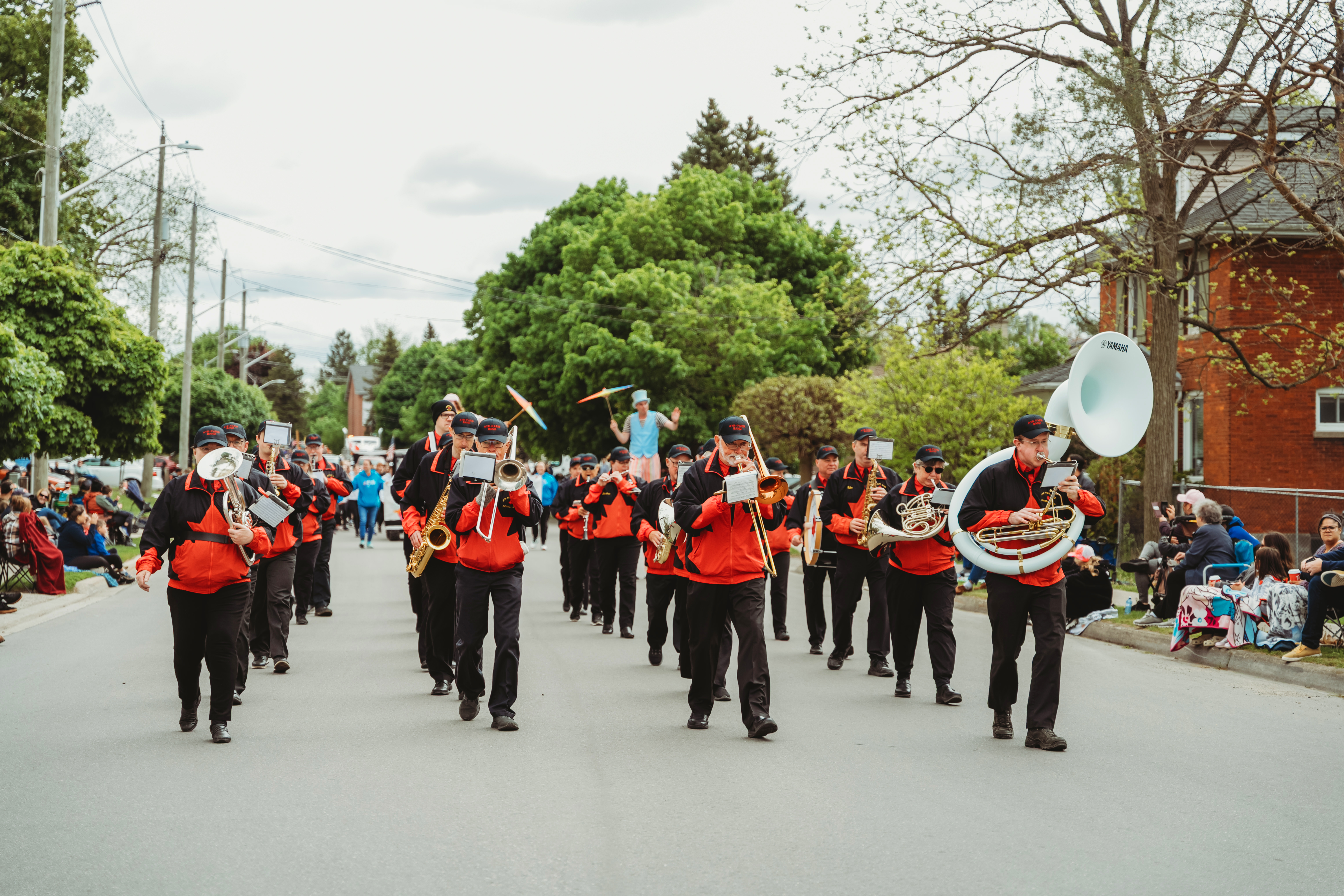 Marching band walking down a street